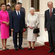 Dariga Nazarbayeva stands with her father, president Nursultan Nazarbayev, alongside Queen Elizabeth and Prince Phillip.